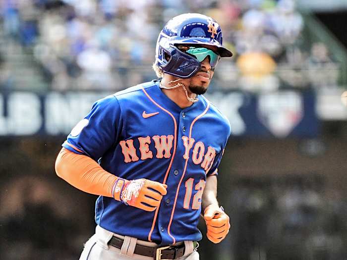 Sep 26, 2021; Milwaukee, Wisconsin, USA; New York Mets shortstop Francisco Lindor (12) runs the bases after hitting a solo home run in the first inning against the Milwaukee Brewers at American Family Field.